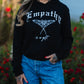 EMPATHY IS A GIFT WOMEN'S HOODIE